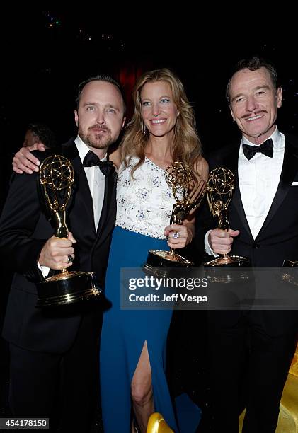 Actor Aaron Paul, actress Anna Gunn and actor Bryan Cranston attend the 66th Annual Primetime Emmy Awards Governors Ball held at Los Angeles...