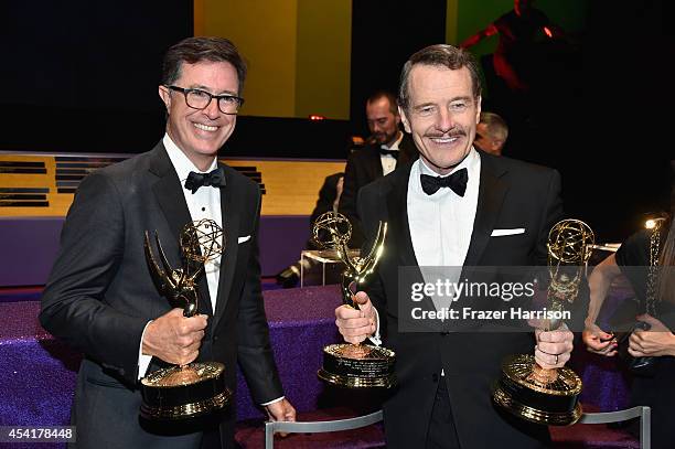 Writer/Producer/Host Stephen Colbert , winner of the for Outstanding Variety Series Award for The Colbert Report and actor Bryan Cranston, winner of...