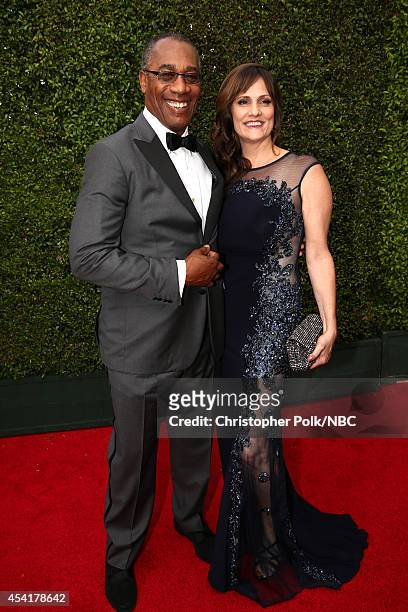 66th ANNUAL PRIMETIME EMMY AWARDS -- Pictured: Actor Joe Morton and Christine Lietz arrive to the 66th Annual Primetime Emmy Awards held at the Nokia...