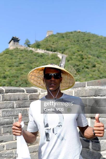 Player Rajon Rondo of the Boston Celtics visits the Great Wall at Juyongguan on August 26, 2014 in Beijing, China.