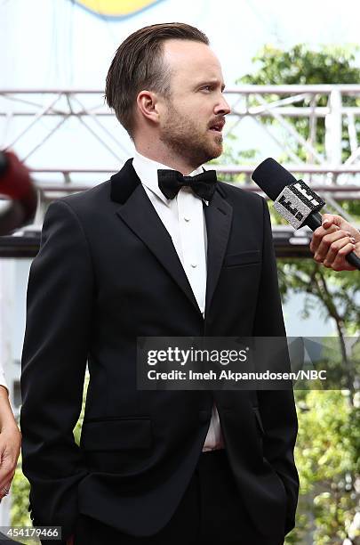 Pictured: Actor Aaron Paul visits E! 'Live From The Red Carpet' at the 66th Annual Primetime Emmy Awards held at the Nokia Theater on August 25, 2014.