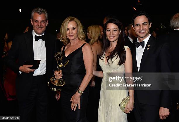 Actors Danny Huston, Jessica Lange, winner of the award for Outstanding Lead Actress in a Miniseries or a Movie, Lucy Liu and fashion designer Zac...