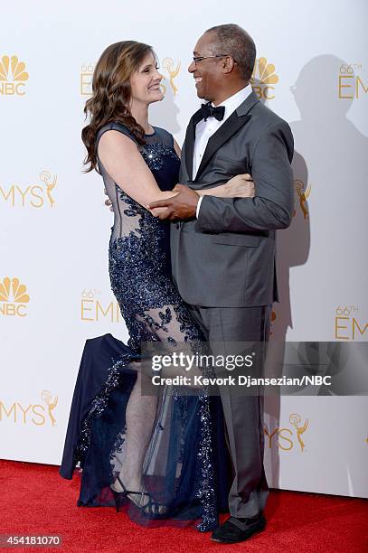 66th ANNUAL PRIMETIME EMMY AWARDS -- Pictured: Actor Joe Morton and Christine Lietz pose in the press room during the 66th Annual Primetime Emmy...