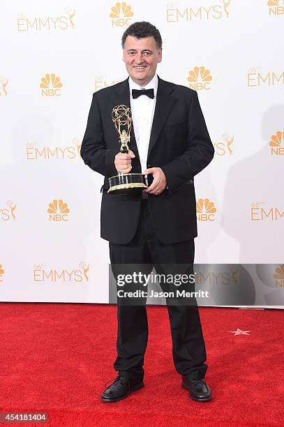 Writer Steven Moffat , winner of the Outstanding Writing for a Miniseries, Movie or a Dramatic Special Award for Sherlock: "His Last Vow", poses in...