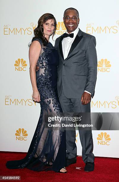 Actor Joe Morton and Christine Lietz pose in the press room at the 66th Annual Primetime Emmy Awards at the Nokia Theatre L.A. Live on August 25,...