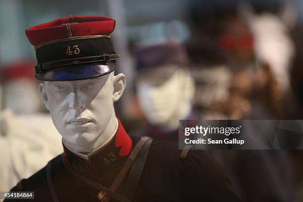 Mannequins of German and French soldiers from World War I stand on display at the Museum of the Great War at Meaux on August 25, 2014 in Meaux,...