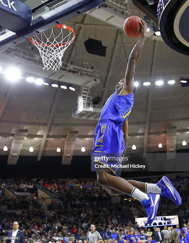 Davon Usher of the Delaware Fightin Blue Hens goes up for the dunk