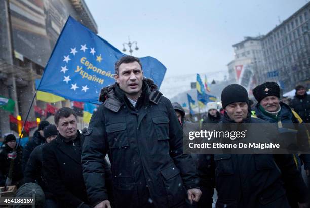 Opposition leader Vitali Klitschko leaves the Trade Unions building before going on stage to deliver a speech to the crowd of protesters on December...