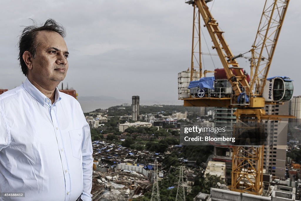 Slum Developer Omkar Realtors & Developers Pvt. Managing Director Babulal Varma Portraits And Views Of The Company's Cresent Bay Development