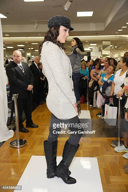 Model poses during the I.N.C. International Concepts Fashion Presentation Hosted By Camila Alves And Ramshackle Glam's Jordan Reid at Macy's...