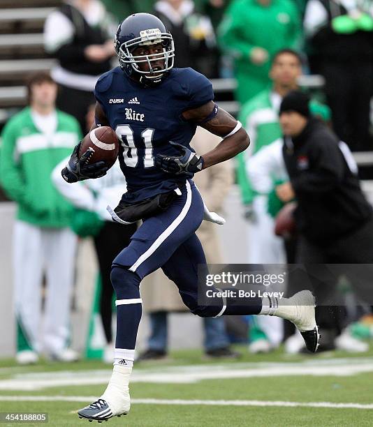 Donte Moore of the Rice Owls makes a catch for a 35 yard touchdown in the first quarter against the Marshall Thundering Herd at Rice Stadium on...