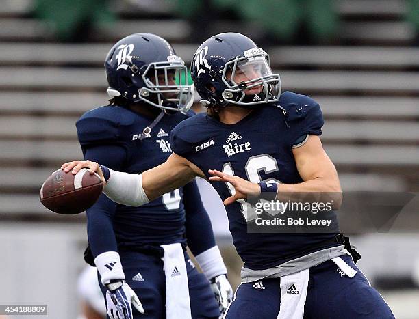 Taylor McHargue of the Rice Owls warms up before playing the Marshall Thundering Herd at Rice Stadium on December 7, 2013 in Houston, Texas.