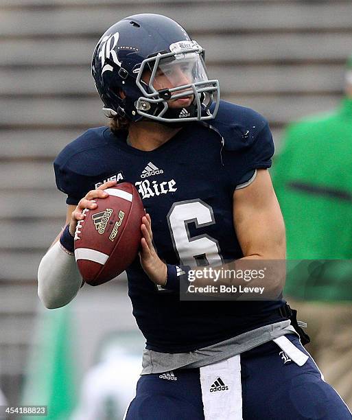 Taylor McHargue of the Rice Owls warms up before playing the Marshall Thundering Herd at Rice Stadium on December 7, 2013 in Houston, Texas.