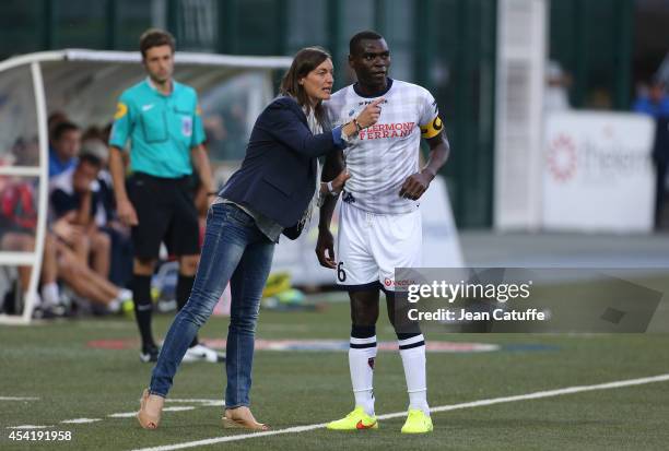 Corinne Diacre, first woman's coach in French professional football, at Clermont Foot Auvergne gives her instructions to her captain Eugene Ekobo...