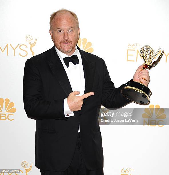 Louis C.K. Poses in the press room at the 66th annual Primetime Emmy Awards at Nokia Theatre L.A. Live on August 25, 2014 in Los Angeles, California.