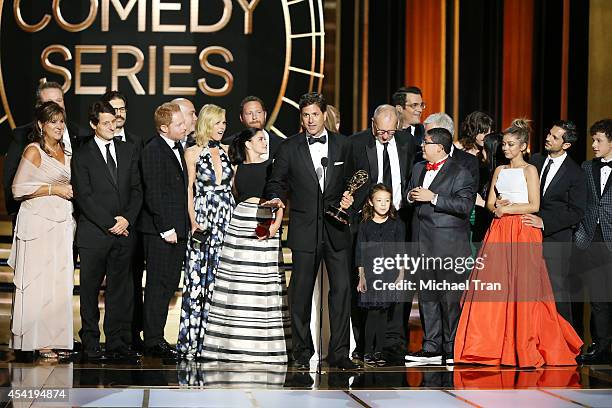 Steve Levitan and cast and crew of 'Modern Family' appear onstage during the 66th Annual Primetime Emmy Awards held at Nokia Theatre L.A. Live on...