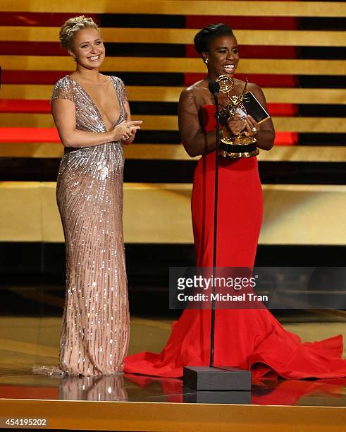 Hayden Panettiere and Uzo Aduba speak onstage during the 66th Annual Primetime Emmy Awards held at Nokia Theatre L.A. Live on August 25, 2014 in Los...