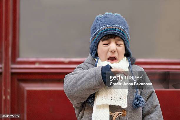 outdoor portrait of sneezing boy - sneeze stock pictures, royalty-free photos & images