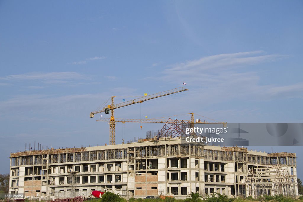 Construction site with crane and building