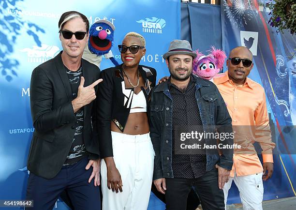 Michael Fitzpatrick, Grover, Noelle Scaggs, James King, Abby Cadabby and Daymond John attend the 2014 US Open's 14th Annual USTA Opening Night Gala...