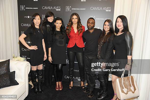 Camila Alves poses with Macy's employees at the I.N.C. International Concepts Fashion Presentation Hosted By Camila Alves And Ramshackle Glam's...