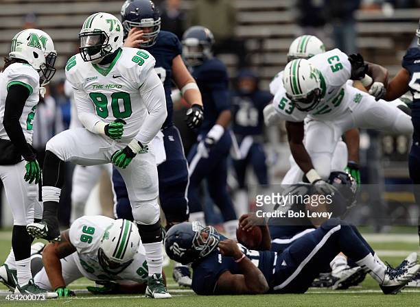 Arnold Blackmon of the Marshall Thundering Herd celebrates after a defensive stop against the Rice Owls at Rice Stadium on December 7, 2013 in...