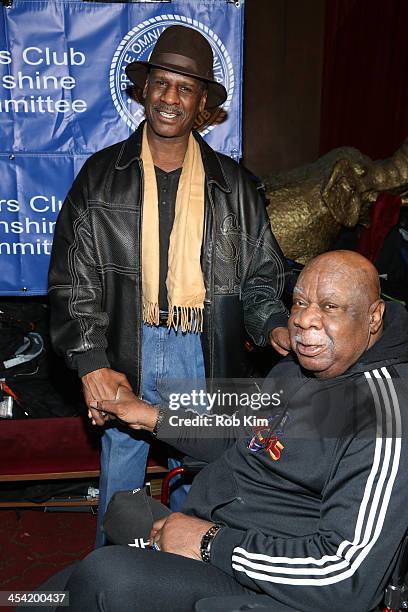 Michael Spinks and Cal Ramsey attend the "Cloudy With A Chance of Meatballs 2" Holiday Screening hosted by The Friar's Club at Ziegfeld Theater on...