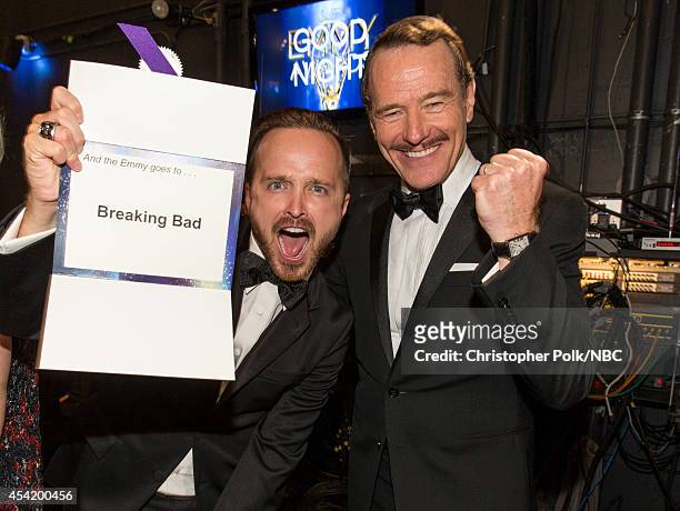 66th ANNUAL PRIMETIME EMMY AWARDS -- Pictured: Actors Aaron Paul and Bryan Cranston, winners of Outstanding Drama Series for 'Breaking Bad', pose...