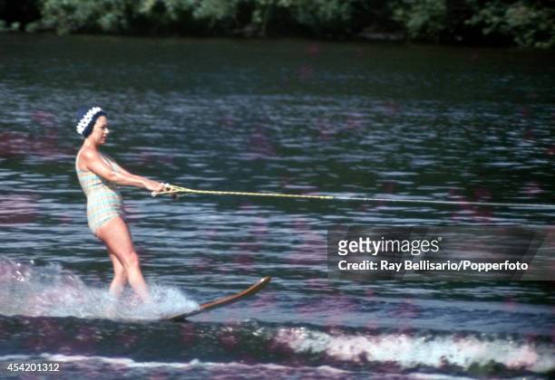 Princess Margaret water-skiing at Sunninghill Park, Windsor on 9th July 1967. This image is one of a series taken by Ray Bellisario who was credited...