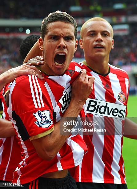 Jack Rodwell of Sunderland celebrates scoring his goal with Wes Brown during the Barclays Premier League match between Sunderland and Manchester...