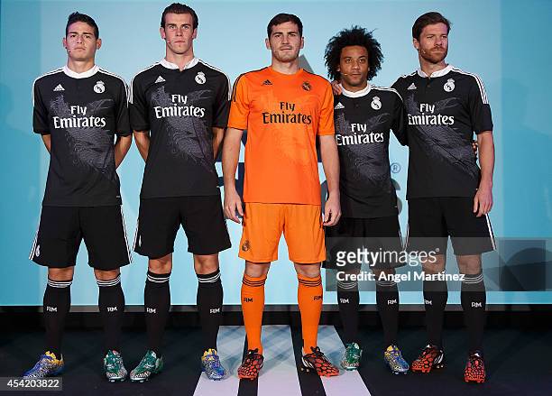 James Rodriguez, Gareth Bale, Iker Casillas, Marcelo Vieira and Xabi Alonso of Real Madrid during the Adidas 3rd kit launch at Estadio Santiago...