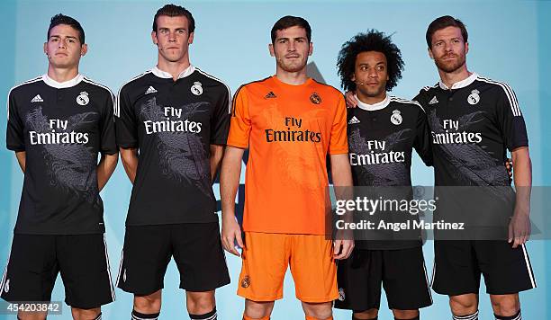 James Rodriguez, Gareth Bale, Iker Casillas, Marcelo Vieira and Xabi Alonso of Real Madrid during the Adidas 3rd kit launch at Estadio Santiago...