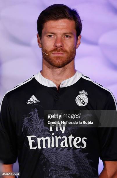 Xabi Alonso of Real Madrid poses during the adidas 3rd kit launch at Estadio Santiago Bernabeu on August 26, 2014 in Madrid, Spain.