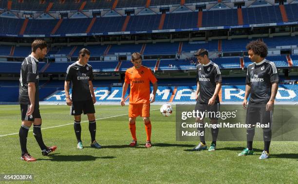 Xabi Alonso, Gareth Bale, Iker Casillas, James Rodriguez and Marcelo Vieira of Real Madrid during the adidas 3rd kit launch at Estadio Santiago...