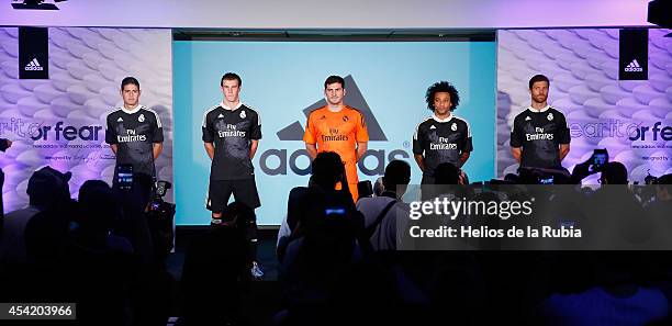 James Rodriguez, Gareth Bale, Iker Casillas, Marcelo Vieira and Xabi Alonso of Real Madrid during the Adidas 3rd kit launch at Estadio Santiago...