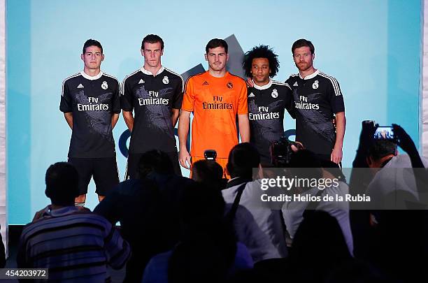 James Rodriguez, Gareth Bale, Iker Casillas, Marcelo Vieira and Xabi Alonso of Real Madrid during the Adidas 3rd kit launch at Estadio Santiago...