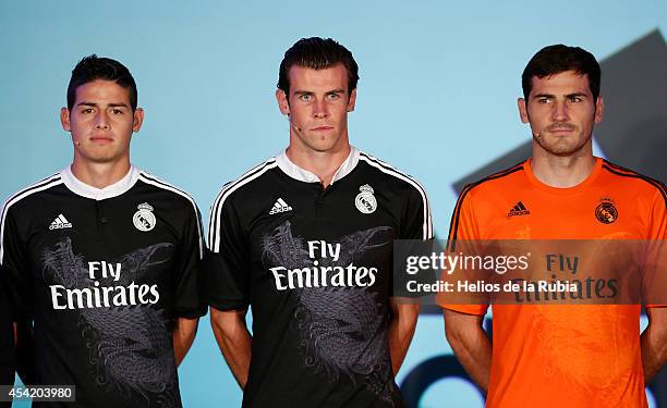 James Rodriguez, Gareth Bale and Iker Casillas of Real Madrid during the Adidas 3rd kit launch at Estadio Santiago Bernabeu on August 26, 2014 in...