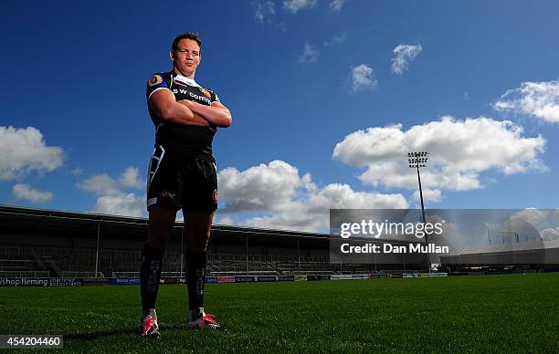 Tom Johnson of Exeter Chiefs poses during the photocall at Sandy Park on AUGUST 26, 2014 in Exeter, England.