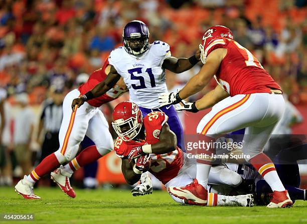 Cyrus Gray of the Kansas City Chiefs carries the ball during the preseason game against the Minnesota Vikings at Arrowhead Stadium on August 23, 2014...