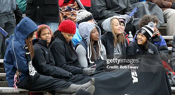 Fans and students braved the bitter cold temperatures as they watch the Rice Owls play the Marshall Thundering Herd at Rice Stadium on December 7,...