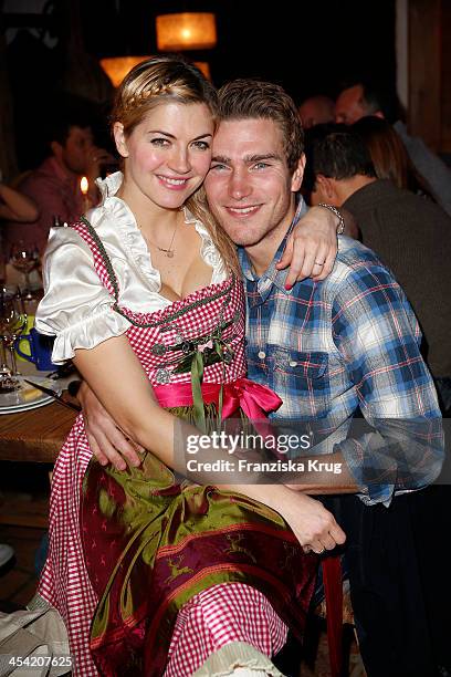 Nina Bott and Benjamin Baarz attend the Dorfstadl Evening - Tirol Cross Mountain 2013 on December 07, 2013 in Innsbruck, Austria.