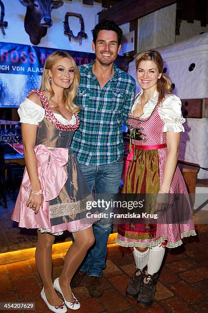 Jana Julie Kilka, Jan Kralitschka and Nina Bott attend the Dorfstadl Evening - Tirol Cross Mountain 2013 on December 07, 2013 in Innsbruck, Austria.