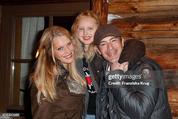 Anika Bormann, Gioia Filomena Burkhard and Gedeon Burkhard attend the Dorfstadl Evening - Tirol Cross Mountain 2013 on December 07, 2013 in...