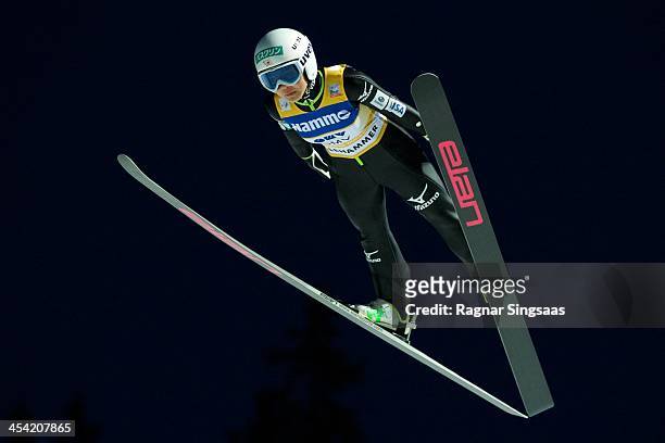 Sara Takanashi of Japan takes 1st place during the FIS Ski Jumping World Cup Women's HS100 on December 7, 2013 in Lillehammer, Norway.