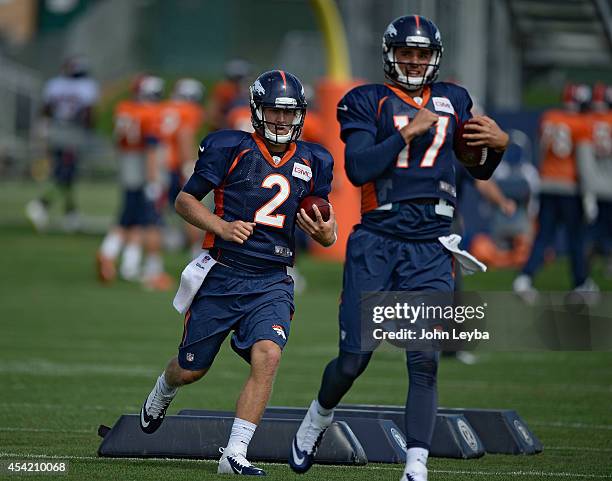 Denver Broncos quarterback Zac Dysert runs through drills during practice August 26, 2014 at Dove Valley.