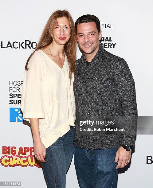 Alysia Reiner and David Alan Basche attend the 2013 Big Circus Apple benefit at Damrosch Park, Lincoln Center on December 7, 2013 in New York City.