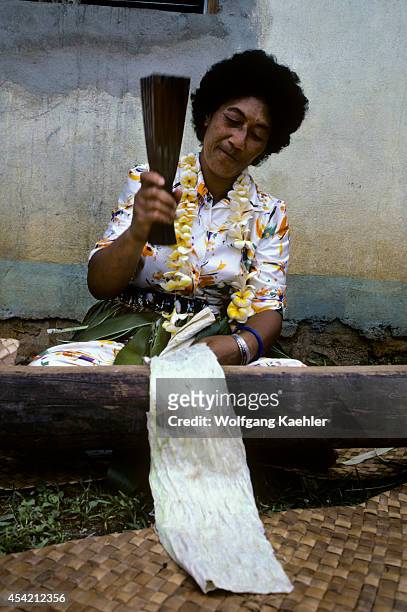 Tonga Islands,vava'u Isl. Tapa Cloth Production, Woman Pounding Mangrove Bark W/ Wooden Mallet.