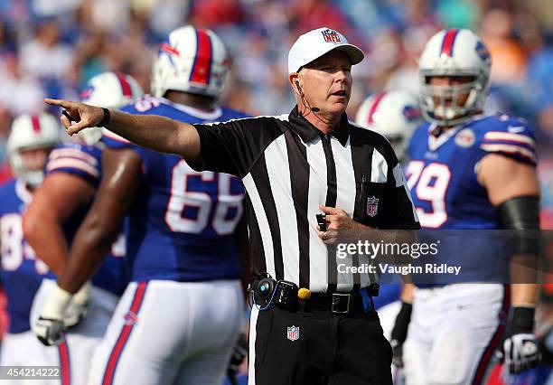 Referee Terry McAulay makes a call during the Buffalo Bills game against the Tampa Bay Buccaneers at Ralph Wilson Stadium on August 23, 2014 in...