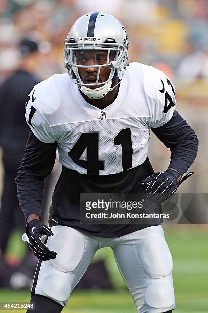 Jonathan Dowling of the Oakland Raiders warms up prior to a preseason game against the Green Bay Packers at Lambeau Field on August 22, 2014 in Green...