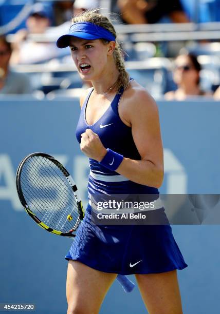 Eugenie Bouchard of Canada celebrates after defeating Olga Govortsova of Belarus to win their women's singles first round match on Day Two of the...